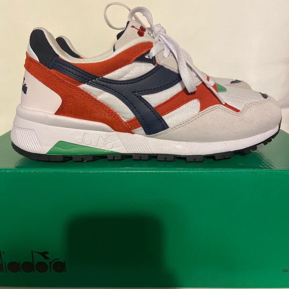 White, navy, green and red Diadora sneakers.